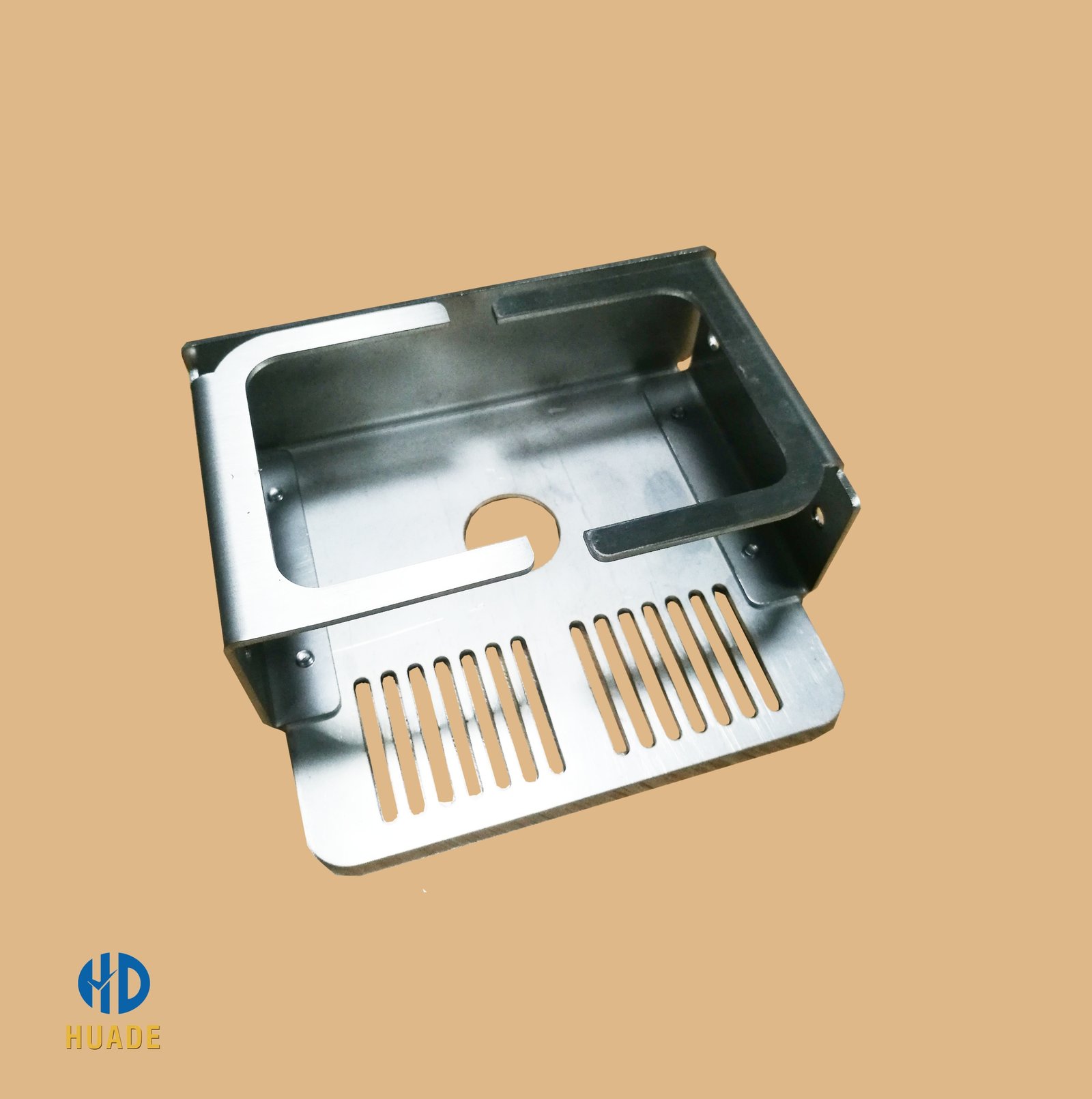 Bent sheet metal housing with vent slots
